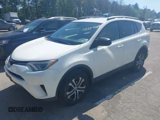 2017 Toyota RAV4 LE with VIN JTMBFREV4HJ112595, listed as a IAAI auction lot 42234289 with 207,379 mi miles and . Bid and sale history available at carsss.com. Image 18.