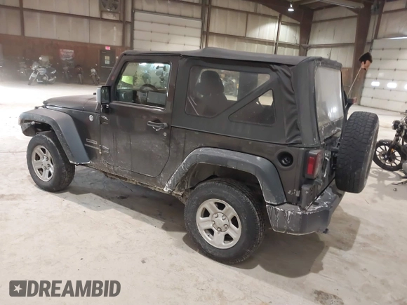 2014 Jeep Wrangler Sport with VIN 1C4AJWAG6EL167579, listed as a IAAI auction lot 41801276 with 137,639 mi miles and . Bid and sale history available at DreamBid. Image 3.