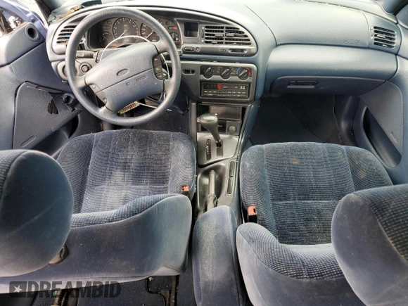1995 Ford Contour z VIN 1FALP65L7SK244644, wystawiony jako Copart lot #51668445 z przebiegiem 100 085 mil mil oraz Szkody całkowita. Historia ofert i sprzedaży dostępna na DreamBid. Obrazek 8.