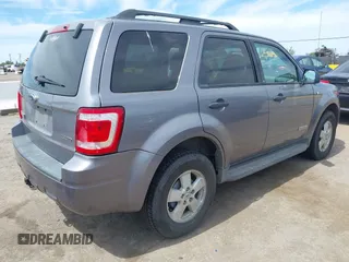 2008 Ford Escape XLT with VIN 1FMCU93128KA42482, listed as a IAAI auction lot 41979106 with 292,130 mi miles. Bid and sale history available at carsss.com. Image 4.