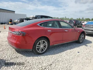 2014 Tesla Model S 60 with VIN 5YJSA1H13EFP30664, listed as a Copart auction lot 53142305 with 113,995 mi miles and Salvage Title. Bid and sale history available at DreamBid. Image 3.