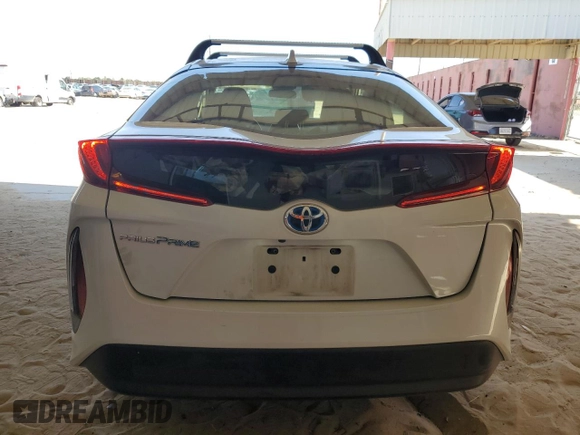 2021 Toyota Prius LE с VIN JTDKAMFP5M3186379, выставлен на аукционе Copart как лот 58527115 с пробегом 93 203 миль миль и Списание • Salvage title. История ставок и продаж доступна на DreamBid. Изображение 6.