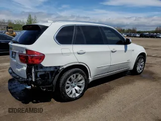 2012 BMW X5 35i z VIN 5UXZV4C59CL759335, wystawiony jako Copart lot #57055065 z przebiegiem 180 589 mil mil oraz Czysty tytuł • Clean title. Historia ofert i sprzedaży dostępna na DreamBid. Obrazek 3.