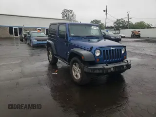 2009 Jeep Wrangler X with VIN 1J4FA24109L712701, listed as a Copart auction lot 60800855 with 156,709 mi miles and Salvage title. Bid and sale history available at DreamBid. Image 13.