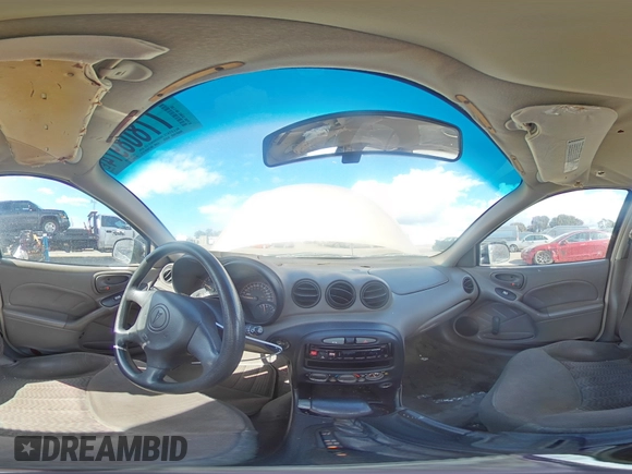2001 Pontiac Grand Am SE z VIN 1G2NE52T91M583582, wystawiony jako Copart lot #77808974 z przebiegiem 126 219 mil mil oraz Szkoda całkowita • Salvage title. Historia ofert i sprzedaży dostępna na DreamBid. Obrazek 12.