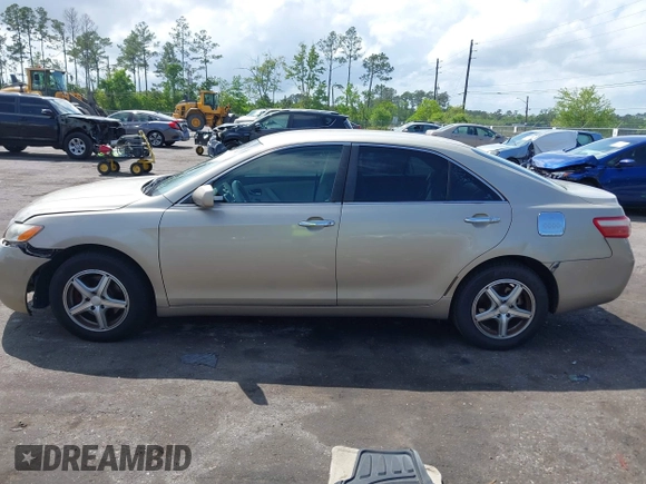 2009 Toyota Camry with VIN 4T1BE46K49U299939, listed as a IAAI auction lot 42012226 with 141,302 mi miles. Bid and sale history available at carsss.com. Image 14.