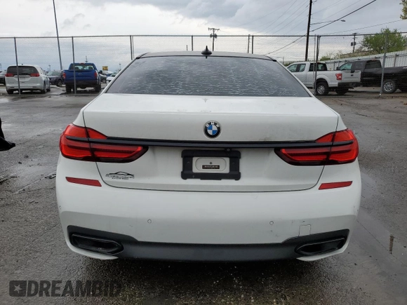 2017 BMW 7 Series 740i with VIN WBA7E2C3XHG741242, listed as a Copart auction lot 51577125 with 101,429 mi miles and Clean Title. Bid and sale history available at carsss.com. Image 6.