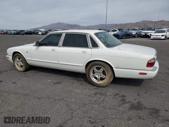 1999 Jaguar XJ with VIN SAJHX1048XC861105, listed as a Copart auction lot 50108225 with Not provided miles and Clean title. Bid and sale history available at DreamBid. Image 2.