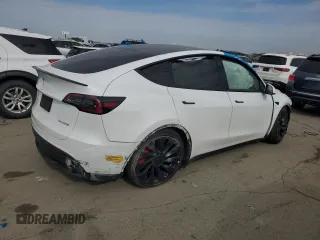 2022 Tesla Model Y Performance with VIN 7SAYGDEF1NF410241, listed as a Copart auction lot 45017155 with 42,652 mi miles and Salvage Title. Bid and sale history available at DreamBid. Image 3.