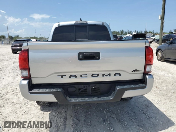2022 Toyota Tacoma SR with VIN 3TYAX5GN2NT045965, listed as a Copart auction lot 58240835 with 54,231 mi miles and Salvage title. Bid and sale history available at DreamBid. Image 6.