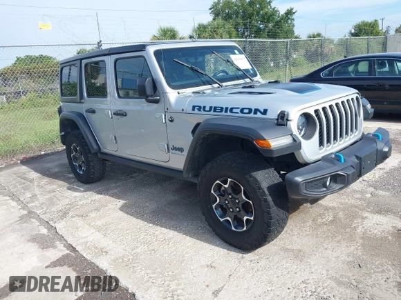 2023 Jeep Wrangler Rubicon with VIN 1C4JJXR63PW703424, listed as a IAAI auction lot 42639653 with 46,412 mi miles and . Bid and sale history available at DreamBid. Image 1.
