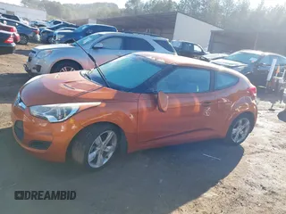2013 Hyundai Veloster w/Gray Int with VIN KMHTC6AD3DU126193, listed as a IAAI auction lot 41251982 with 119,066 mi miles. Bid and sale history available at carsss.com. Image 14.