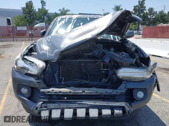 2017 Toyota Tacoma SR5 z VIN 3TMAZ5CN0HM039730, wystawiony jako IAAI lot #42406448 z przebiegiem 69 530 mil mil oraz . Historia ofert i sprzedaży dostępna na DreamBid. Obrazek 6.