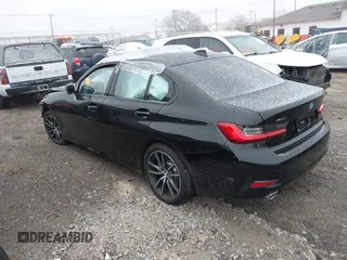 2020 BMW 3 Series 330i xDrive with VIN WBA5R7C08LFH44012, listed as a IAAI auction lot 41252675 with 57,486 mi miles. Bid and sale history available at carsss.com. Image 3.