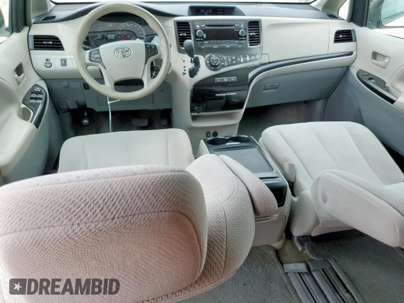 2014 Toyota Sienna LE AAS with VIN 5TDKK3DC1ES424249, listed as a Copart auction lot 62114525 with 193,301 mi miles and Salvage title. Bid and sale history available at DreamBid. Image 8.