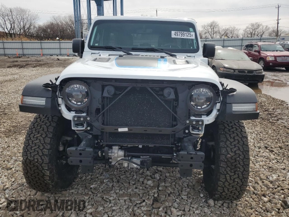 2023 Jeep Wrangler Rubicon z VIN 1C4JJXR6XPW663181, wystawiony jako Copart lot #49799125 z przebiegiem 8 085 mil mil oraz Szkoda całkowita • Salvage title. Historia ofert i sprzedaży dostępna na DreamBid. Obrazek 5.