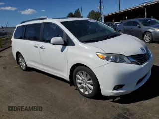 2014 Toyota Sienna Ltd with VIN 5TDDK3DCXES090201, listed as a Copart auction lot 43001075 with 183,788 mi miles and Salvage Title. Bid and sale history available at carsss.com. Image 4.