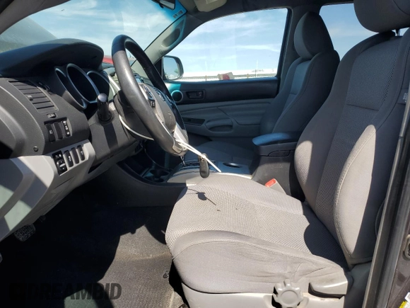 2015 Toyota Tacoma with VIN 3TMMU4FN7FM078006, listed as a Copart auction lot 59129495 with 244,062 mi miles and Salvage title. Bid and sale history available at DreamBid. Image 7.