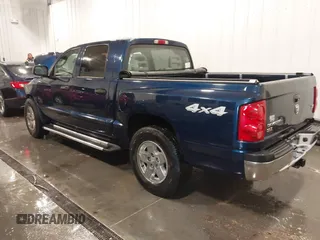 2005 Dodge Dakota SLT with VIN 1D7HW48N45S275932, listed as a IAAI auction lot 41763401 with 100,819 mi miles. Bid and sale history available at carsss.com. Image 3.