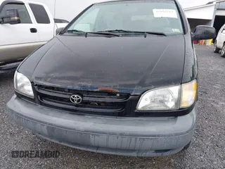 1998 Toyota Sienna LE with VIN 4T3ZF13C6WU016001, listed as a IAAI auction lot 42604162 with 214,491 mi miles and . Bid and sale history available at DreamBid. Image 13.