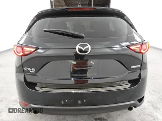 2021 Mazda CX-5 Grand Touring with VIN JM3KFBDM6M0487606, listed as a Copart auction lot 45399655 with 25,241 mi miles and Clean Title. Bid and sale history available at DreamBid. Image 6.