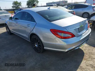 2014 Mercedes-Benz CLS 550 with VIN WDDLJ7DB0EA104042, listed as a IAAI auction lot 42643727 with 96,841 mi miles and . Bid and sale history available at DreamBid. Image 3.