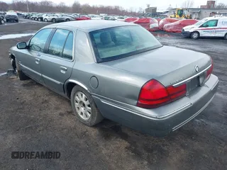 2003 Mercury Grand Marquis LS Premium with VIN 2MEFM75WX3X634344, listed as a IAAI auction lot 41888397 with 129,651 mi miles and . Bid and sale history available at DreamBid. Image 3.