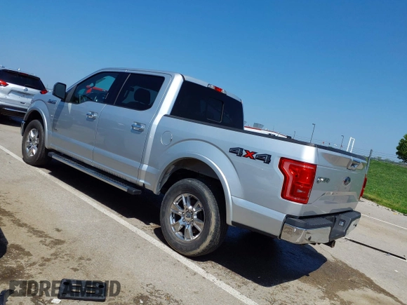 2015 Ford F-150 XLT with VIN 1FTEW1EG8FKE61864, listed as a IAAI auction lot 42120436 with 129,448 mi miles and . Bid and sale history available at DreamBid. Image 3.