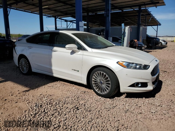 2013 Ford Fusion Titanium Hybrid z VIN 3FA6P0RUXDR376633, wystawiony jako Copart lot #57685555 z przebiegiem 133 248 mil mil oraz Szkoda całkowita • Salvage title. Historia ofert i sprzedaży dostępna na DreamBid. Obrazek 4.
