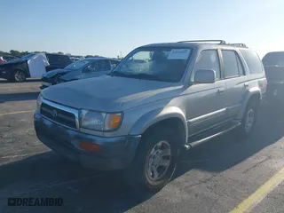 1997 Toyota 4Runner Limited with VIN JT3GN87R3V0043679, listed as a IAAI auction lot 42043029 with 296,834 mi miles. Bid and sale history available at carsss.com. Image 2.