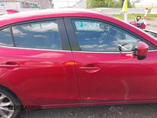 2014 Mazda 3 S Touring with VIN JM1BM1L36E1139818, listed as a IAAI auction lot 42129839 with 134,397 mi miles and . Bid and sale history available at DreamBid. Image 13.