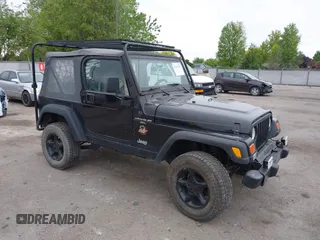 2000 Jeep Wrangler Sahara z VIN 1J4FA59S7YP805628, wystawiony jako IAAI lot #42259201 z przebiegiem Nie podano mil oraz . Historia ofert i sprzedaży dostępna na DreamBid. Obrazek 1.