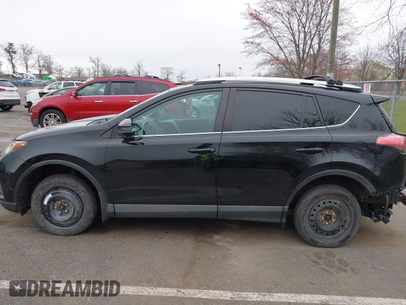 2016 Toyota RAV4 LE with VIN 2T3BFREV3GW447802, listed as a IAAI auction lot 41985438 with 213,247 mi miles. Bid and sale history available at carsss.com. Image 14.