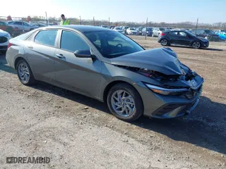 2024 Hyundai Elantra Hybrid Blue with VIN KMHLM4DJ4RU113981, listed as a IAAI auction lot 40877845 with NaN miles. Bid and sale history available at carsss.com. Image 1.