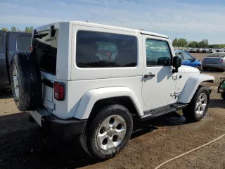 2013 Jeep Wrangler Sahara with VIN 1C4AJWBG0DL517849, listed as a Copart auction lot 58392505 with 119,499 mi miles and Clean title. Bid and sale history available at DreamBid. Image 3.