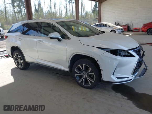 2021 Lexus RX with VIN JTJHZKFA2M2030841, listed as a IAAI auction lot 42009263 with 38,113 mi miles. Bid and sale history available at carsss.com. Image 1.