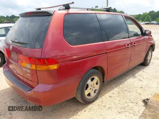 2002 Honda Odyssey EX with VIN 5FNRL18612B028570, listed as a IAAI auction lot 42491201 with 203,401 mi miles and . Bid and sale history available at DreamBid. Image 4.