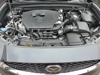 2025 Mazda CX-30 S Carbon Edition z VIN 3MVDMBCM9SM802108, wystawiony jako Copart lot #51937335 z przebiegiem 1 960 mil mil oraz Szkoda całkowita • Salvage title. Historia ofert i sprzedaży dostępna na DreamBid. Obrazek 11.