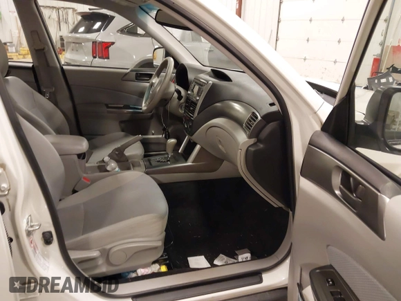 2012 Subaru Forester X with VIN JF2SHBBCXCH433191, listed as a IAAI auction lot 41964271 with 146,176 mi miles and . Bid and sale history available at DreamBid. Image 5.
