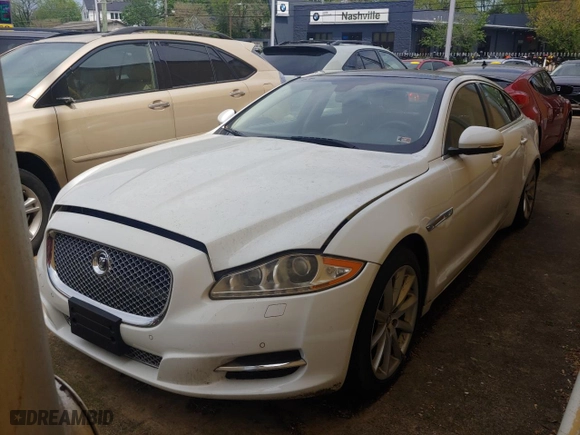 2013 Jaguar XJ with VIN SAJWJ1CD7D8V49599, listed as a Copart auction lot 54008915 with 133,163 mi miles and Clean Title. Bid and sale history available at carsss.com. Image 2.