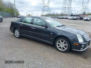 2005 Cadillac STS with VIN 1G6DC67A950164352, listed as a IAAI auction lot 42062780 with 122,634 mi miles. Bid and sale history available at carsss.com. Image 1.