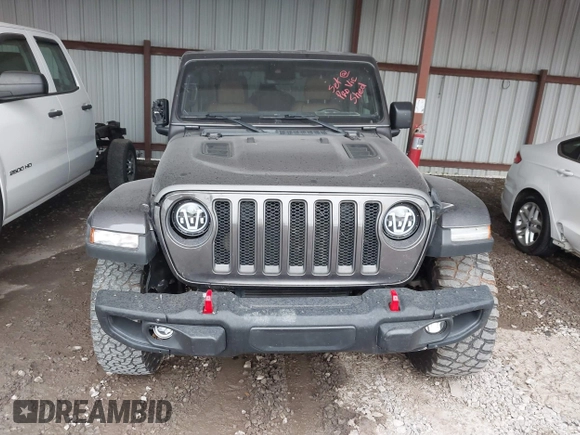 2021 Jeep Wrangler Unlimited Rubicon with VIN 1C4JJXFM6MW538774, listed as a IAAI auction lot 42368651 with 49,490 mi miles and . Bid and sale history available at DreamBid. Image 12.