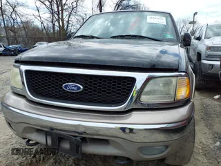 2003 Ford F-150 XL with VIN 1FTRX18L53NB01663, listed as a IAAI auction lot 41887655 with 177,914 mi miles. Bid and sale history available at carsss.com. Image 13.