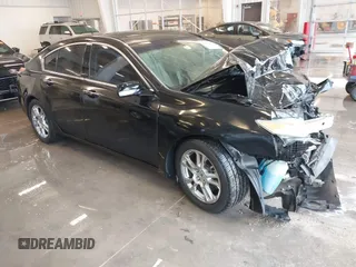 2009 Acura TL Tech with VIN 19UUA86549A010863, listed as a IAAI auction lot 41001252 with 186,441 mi miles. Bid and sale history available at carsss.com. Image 1.