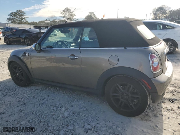 2011 MINI Cooper Convertible with VIN WMWZN3C53BT133576, listed as a Copart auction lot 87543835 with 69,999 mi miles and Salvage Title. Bid and sale history available at carsss.com. Image 2.