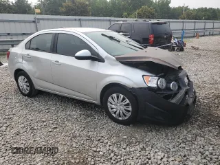 2015 Chevrolet Sonic LS with VIN 1G1JA5SH6F4152196, listed as a Copart auction lot 59096455 with 128,113 mi miles and Salvage title. Bid and sale history available at DreamBid. Image 4.