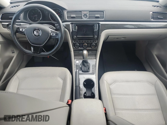 2017 Volkswagen Passat SE with VIN 1VWGT7A35HC002325, listed as a Copart auction lot 57383065 with 39,016 mi miles and Salvage title. Bid and sale history available at DreamBid. Image 8.