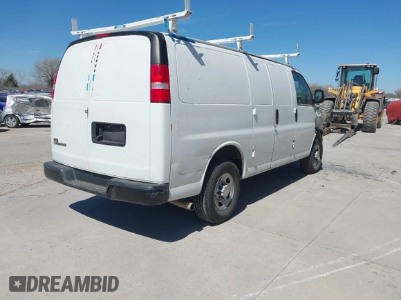 2018 Chevrolet Express Cargo Van with VIN 1GCWGAFP6J1332570, listed as a IAAI auction lot 41482103 with 142,405 mi miles. Bid and sale history available at carsss.com. Image 4.