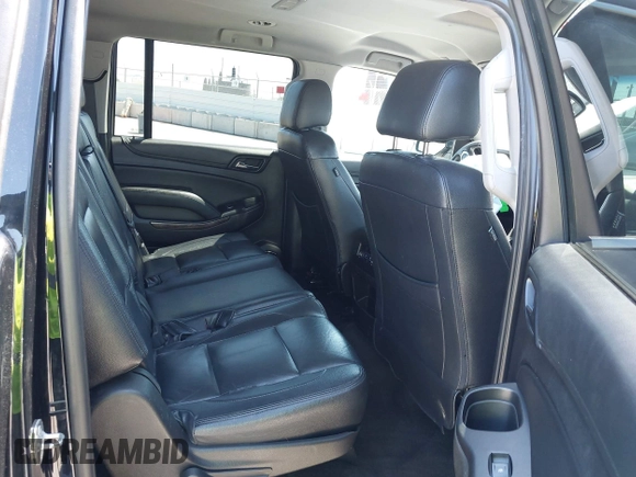 2018 Chevrolet Suburban LS z VIN 1GNSKGKC6JR150248, wystawiony jako IAAI lot #42219120 z przebiegiem 48 321 mil mil oraz . Historia ofert i sprzedaży dostępna na DreamBid. Obrazek 8.