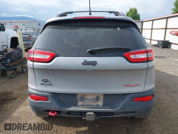 2015 Jeep Cherokee Trailhawk with VIN 1C4PJMBS0FW522182, listed as a IAAI auction lot 42544508 with 74,910 mi miles and . Bid and sale history available at DreamBid. Image 16.